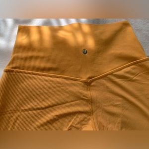 Lululemon leggings. Unusual goldenrod colour. Size 8,  no tags 34” length